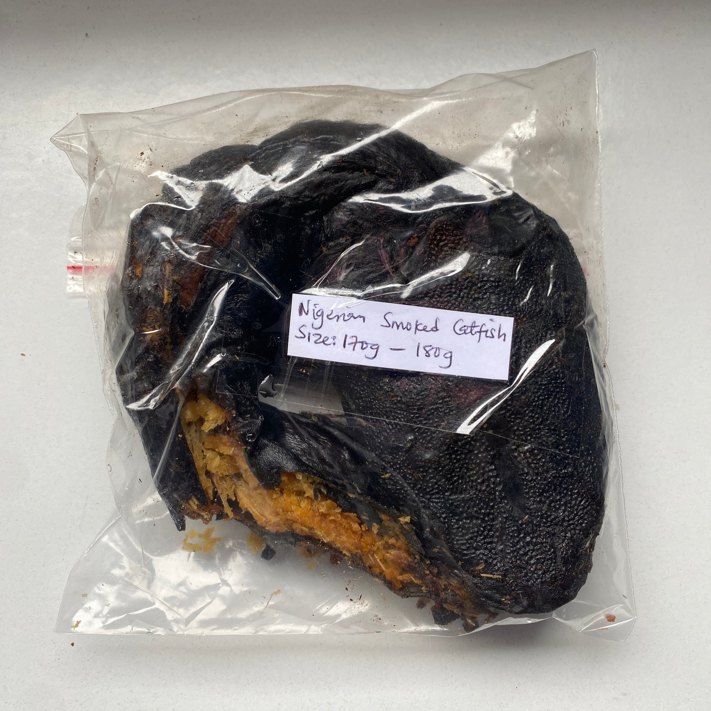 Peixe-gato defumado seco nigeriano